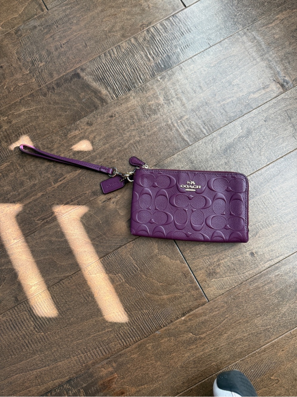 Coach Plum Signature Embossed Leather Wristlet